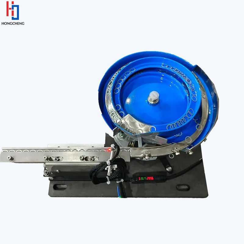 Industrial component feeder orienting small automotive connector parts
